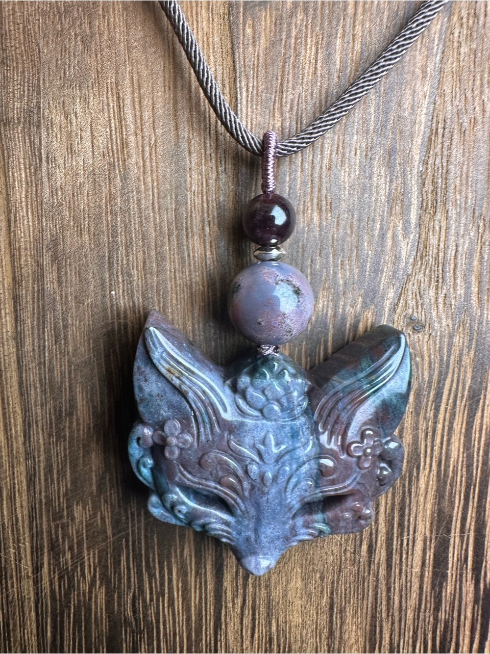 Blue & Purple Ocean Jasper Fox Mask Pendant Necklace on Brown Rope with Garnet - Picture 6 of 13